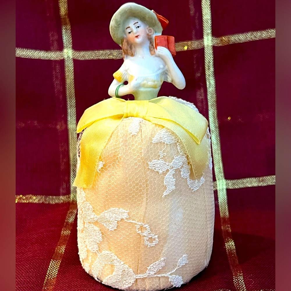 Vintage half doll pincushion.